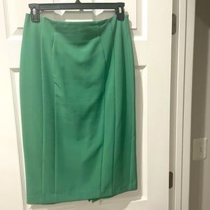 Eva Mendes green stretch skirt set